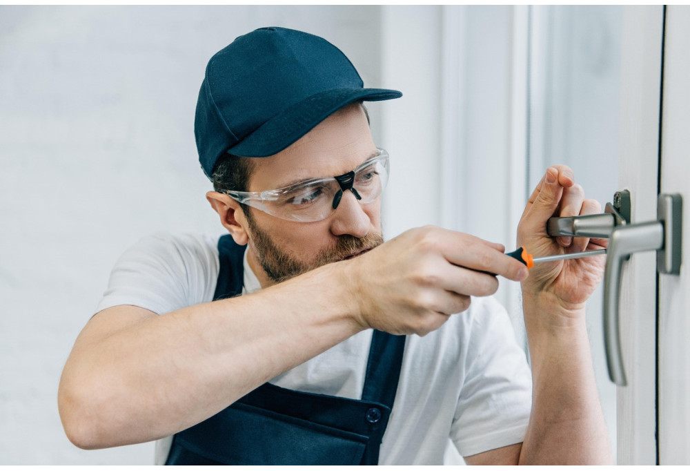 Who should you call to change a door handle?